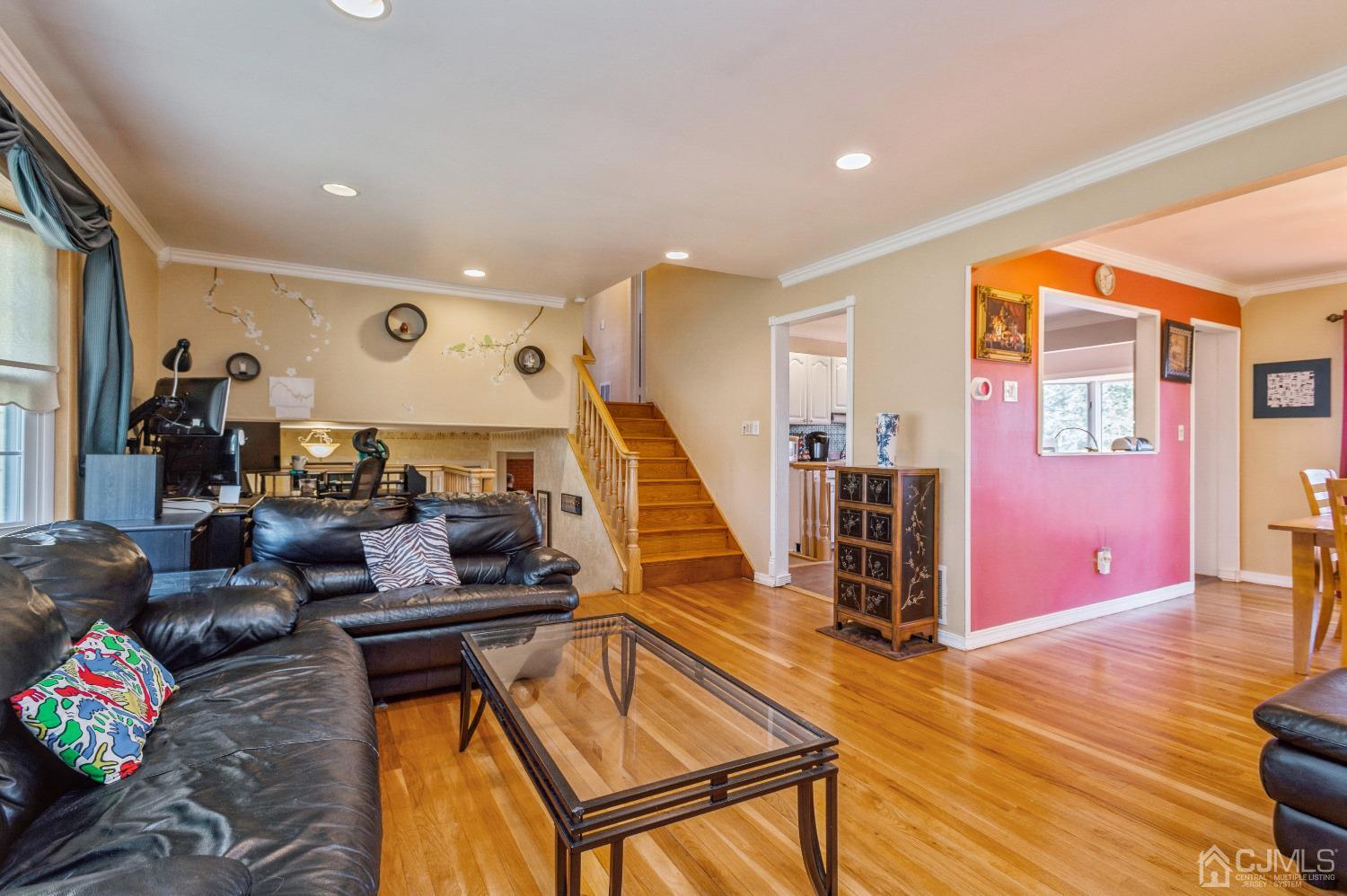 2 Sherwood Road Edison, NJ 08820 - Photo 6 of 26 a living room with furniture and wooden floor