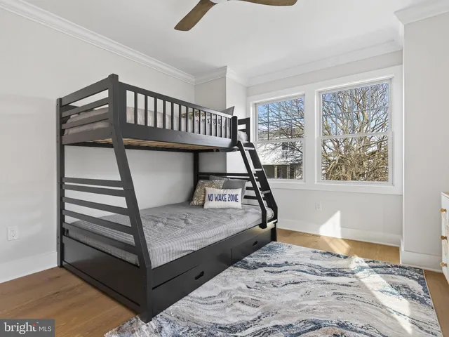 a bedroom with a bed and lamp