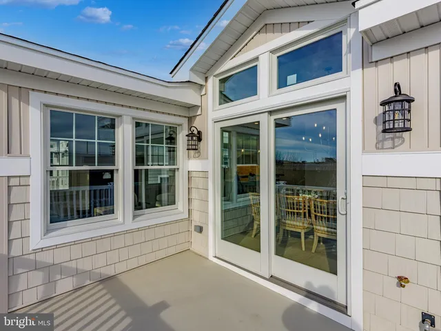 a view of balcony with wooden floor
