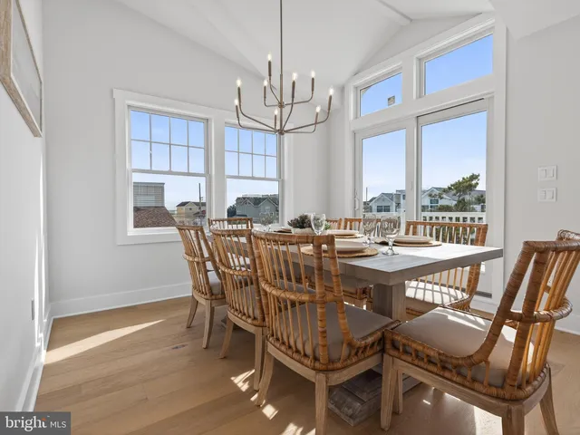 a kitchen with kitchen island a refrigerator stove microwave and cabinets