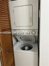 9341 Collins Avenue, Unit 604 Surfside, FL 33154 - Photo 11 of 15 a close up view of washer and dryer
