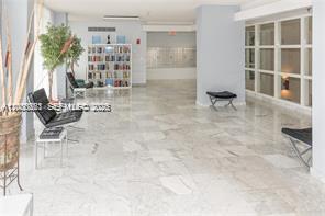 9341 Collins Avenue, Unit 604 Surfside, FL 33154 - Photo 13 of 15 an empty room with windows
