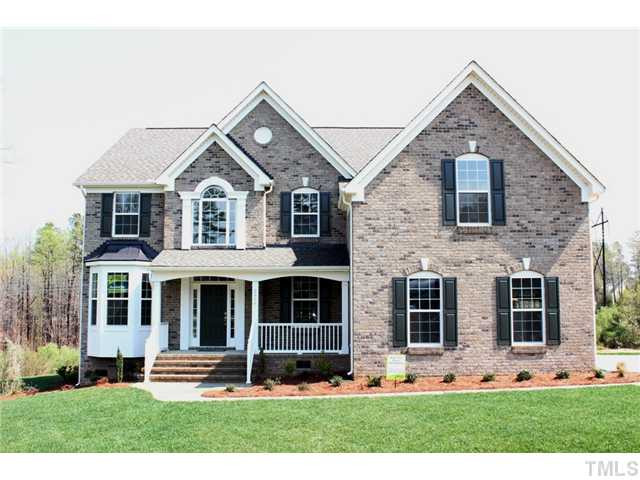 2800 Bending Tree Court, Unit LT8 Raleigh, NC 27613 - Photo 1 of 25 front view of a house with a yard