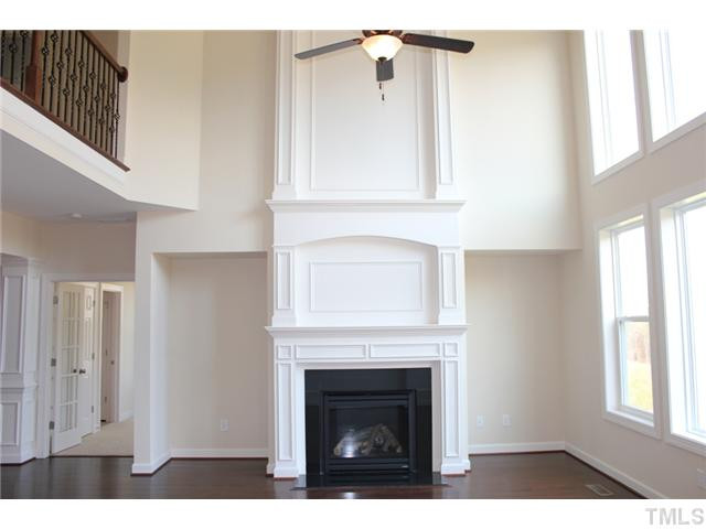 2800 Bending Tree Court, Unit LT8 Raleigh, NC 27613 - Photo 7 of 25 a view of a livingroom with an entryway and fireplace