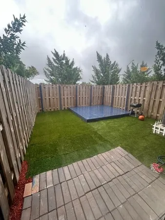 a view of a park with a slide