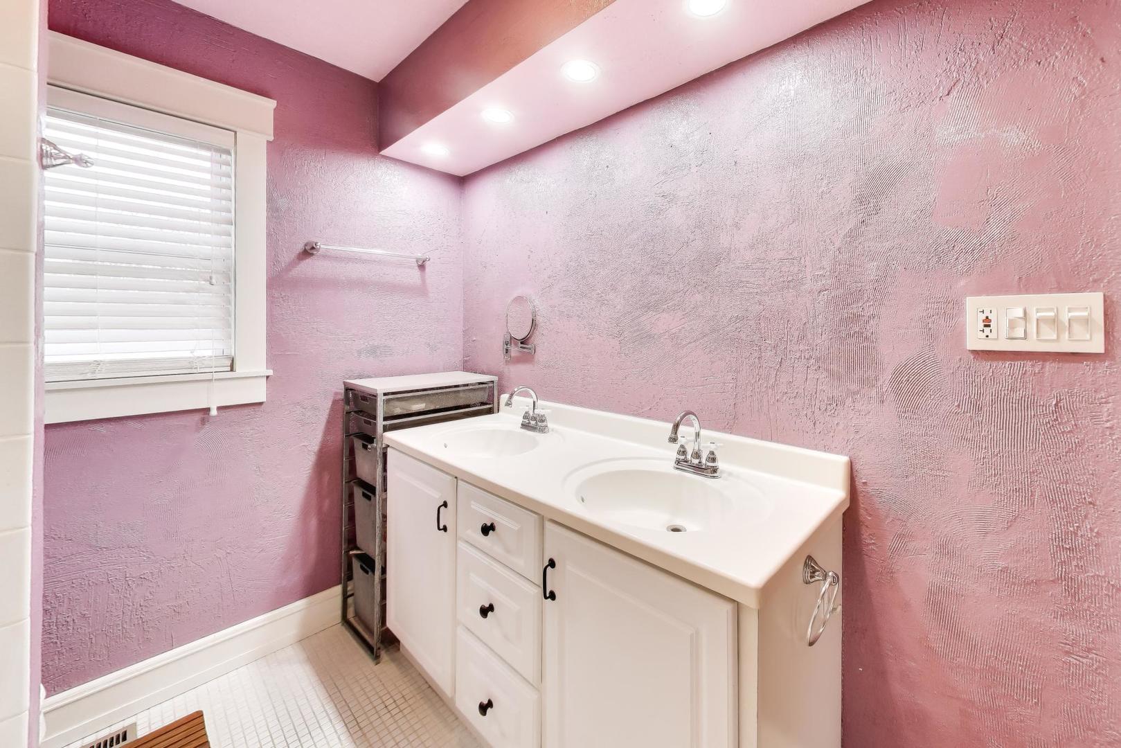 7 Alton Road Prospect Heights, IL 60070 - Photo 28 of 44 a bathroom with a sink a vanity and a mirror