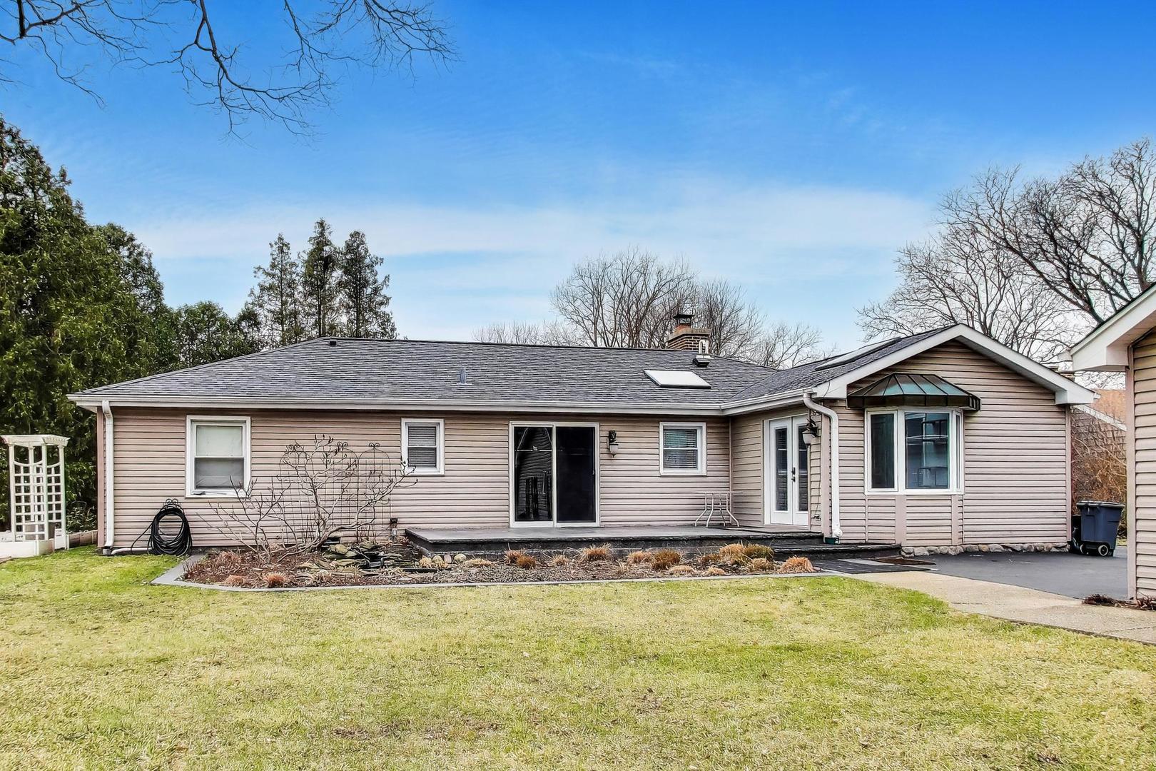 7 Alton Road Prospect Heights, IL 60070 - Photo 31 of 44 a view of a house with swimming pool and a yard