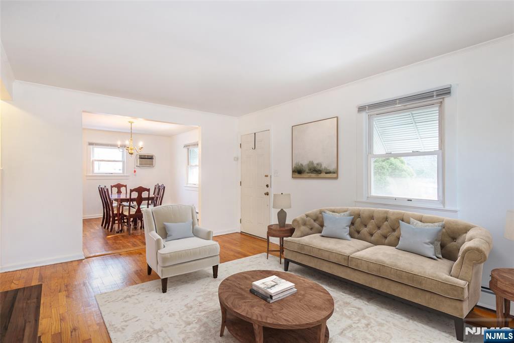 116 Edison Street Clifton, NJ 07013 - Photo 4 of 19 a living room with furniture and a large window