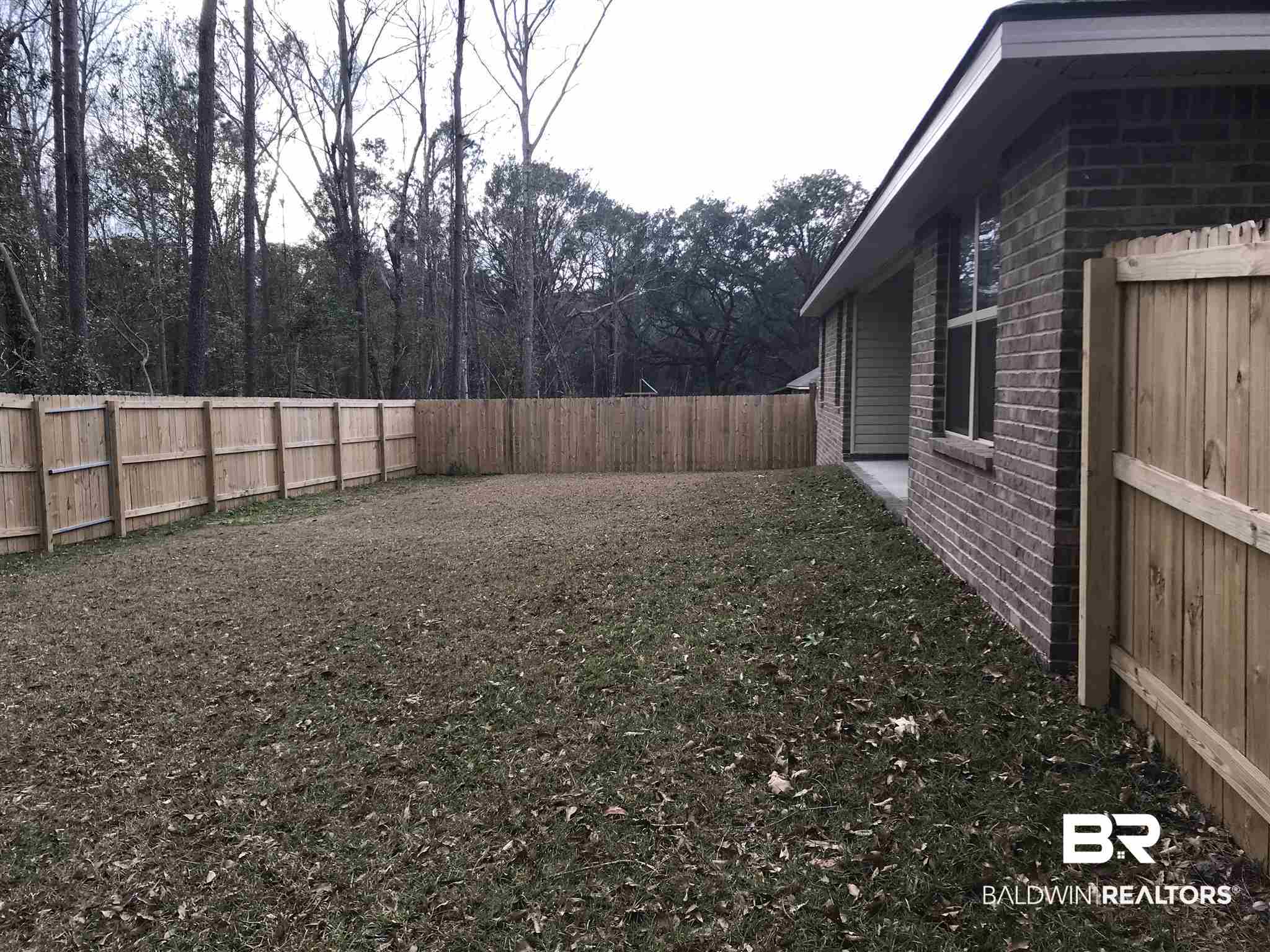 1208 C Whispering Pines Road Daphne, AL 36526 - Photo 26 of 30 Fenced Back Yard