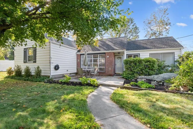 a view of a house with a garden