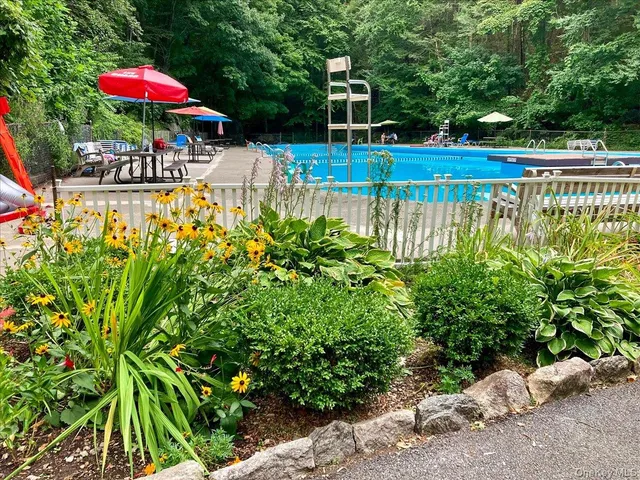 a view of a garden with an outdoor space