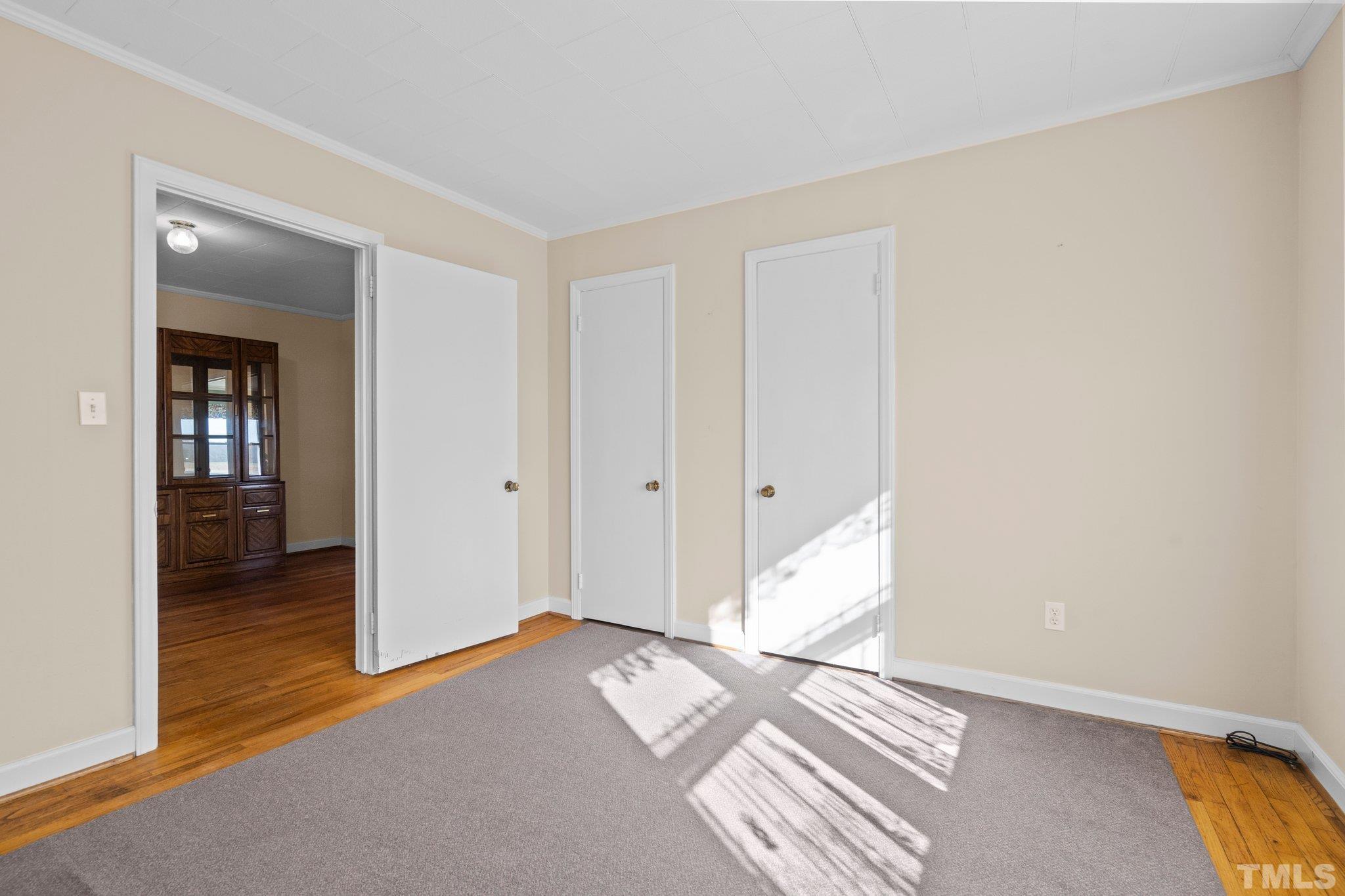 20 Dennys Store Road Roxboro, NC 27574 - Photo 11 of 46 a view of a room with wooden floor and bathroom