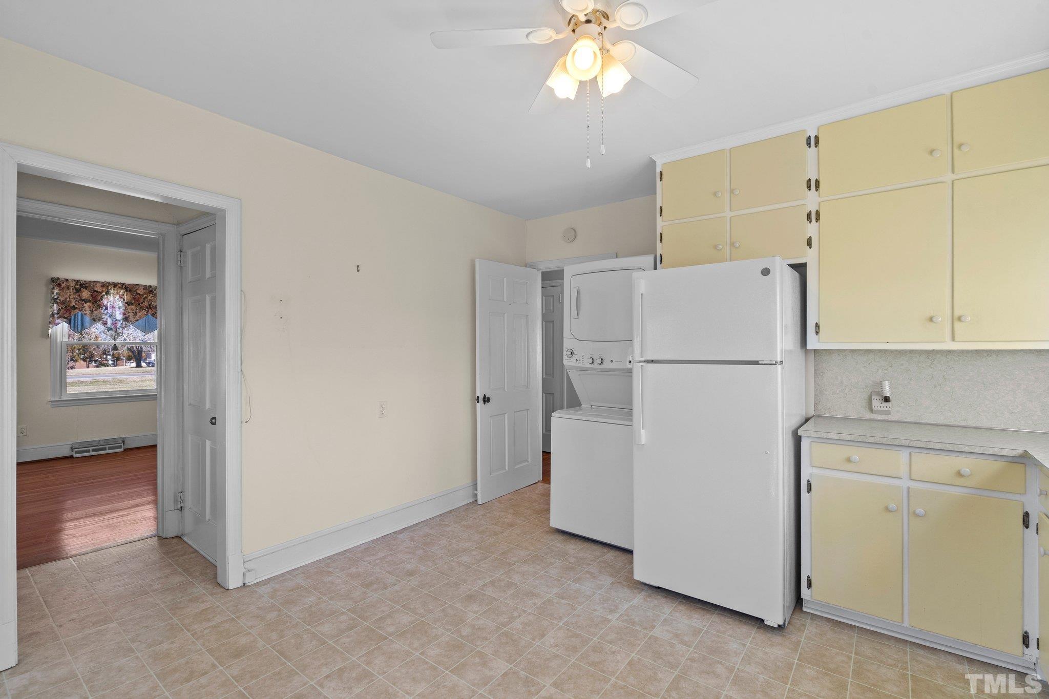 20 Dennys Store Road Roxboro, NC 27574 - Photo 25 of 46 a view of kitchen and closet with wooden floor