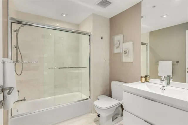 a view of a city with tall buildings