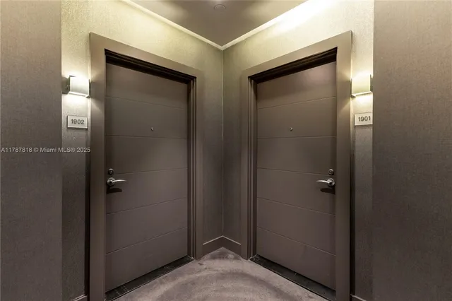 a living room with furniture and a chair