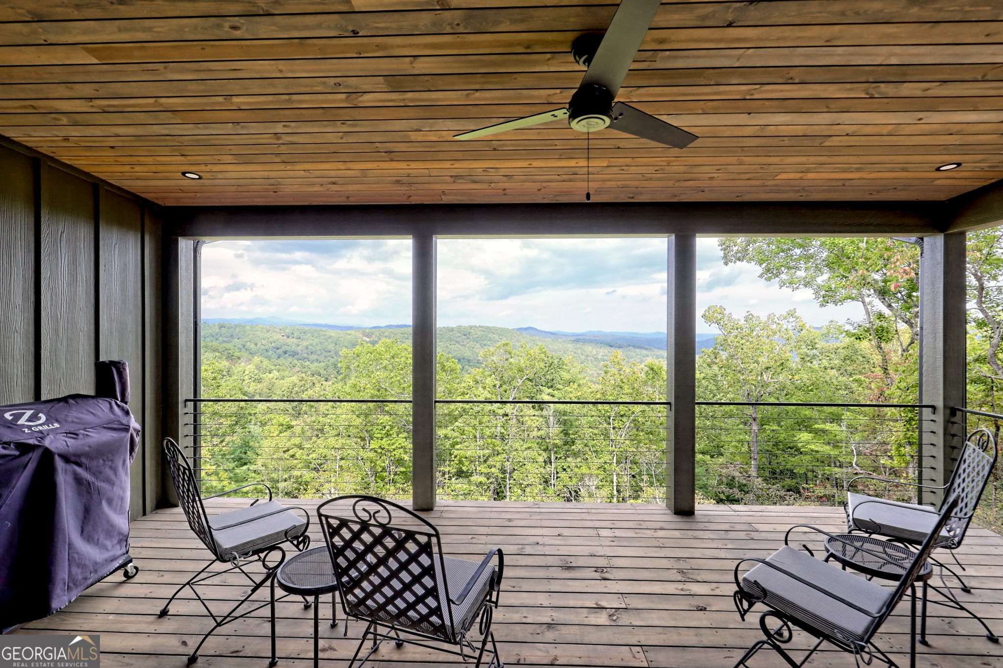 1095 Rabun Bluffs Drive Lakemont, GA 30552 - Photo 13 of 57 a balcony view with a seating space