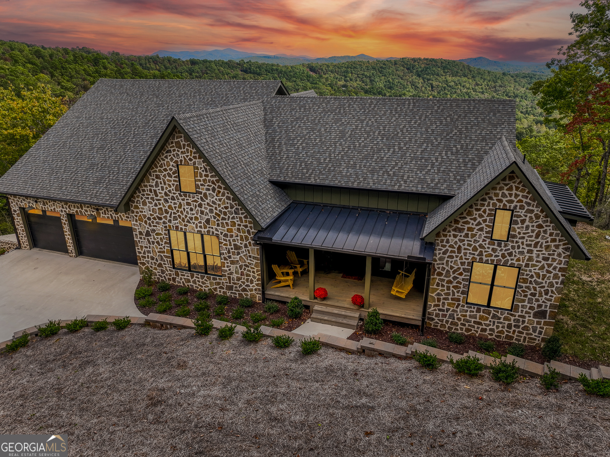 1095 Rabun Bluffs Drive Lakemont, GA 30552 - Photo 2 of 57 a view of a house with a patio and a yard