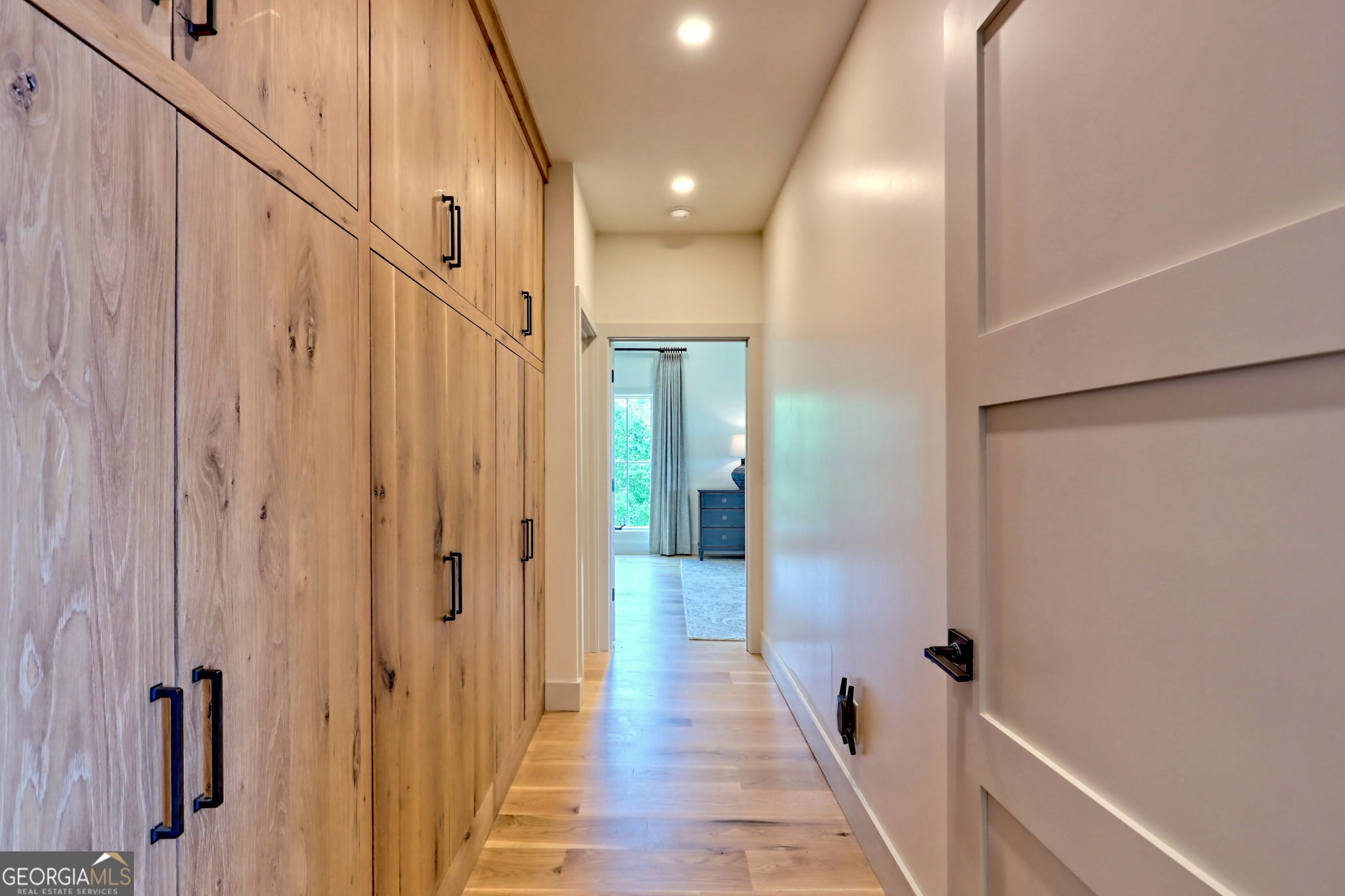 1095 Rabun Bluffs Drive Lakemont, GA 30552 - Photo 25 of 57 a view of a hallway with wooden floor and staircase