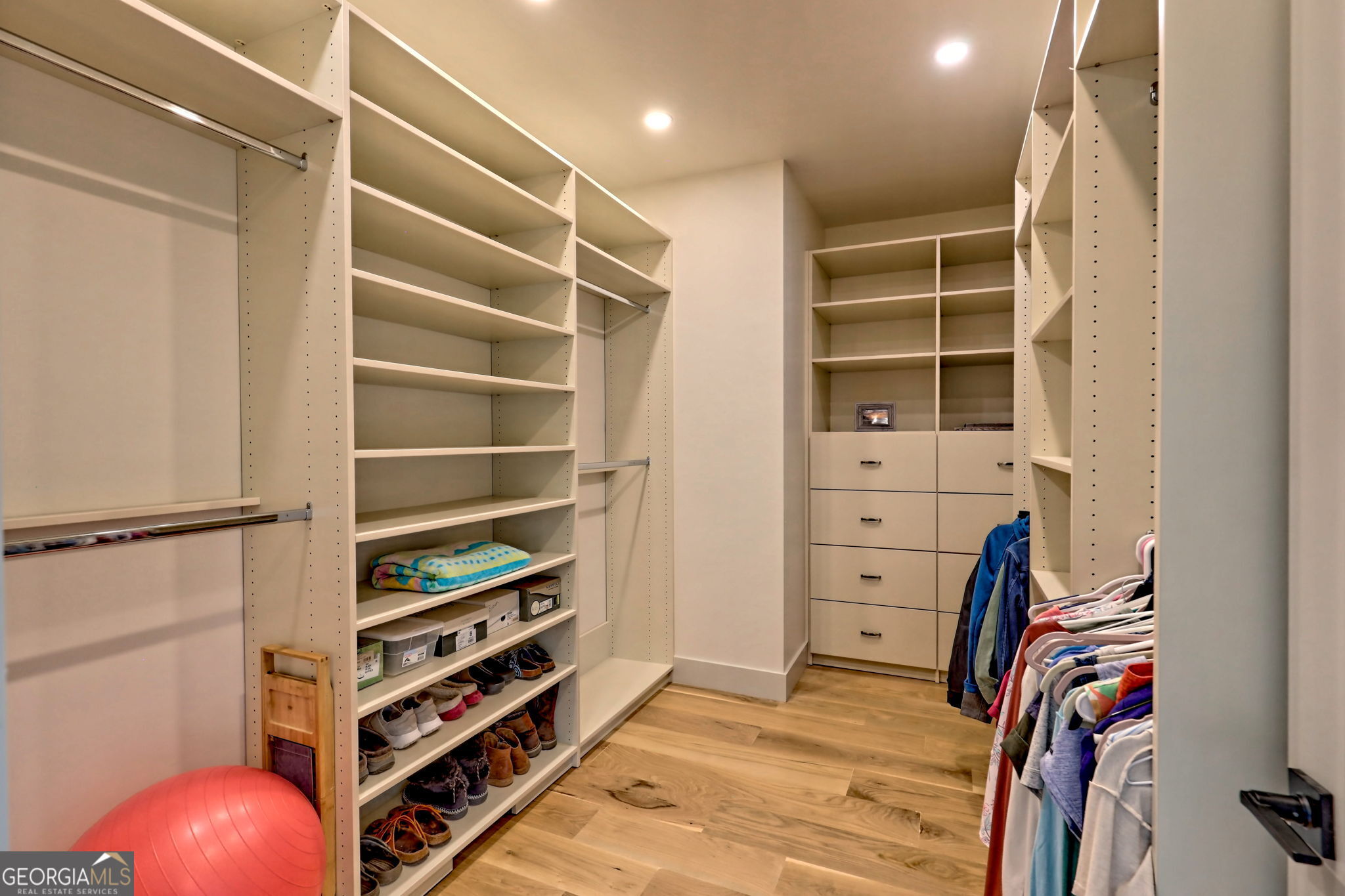 1095 Rabun Bluffs Drive Lakemont, GA 30552 - Photo 32 of 57 a view of walk in closet with empty racks
