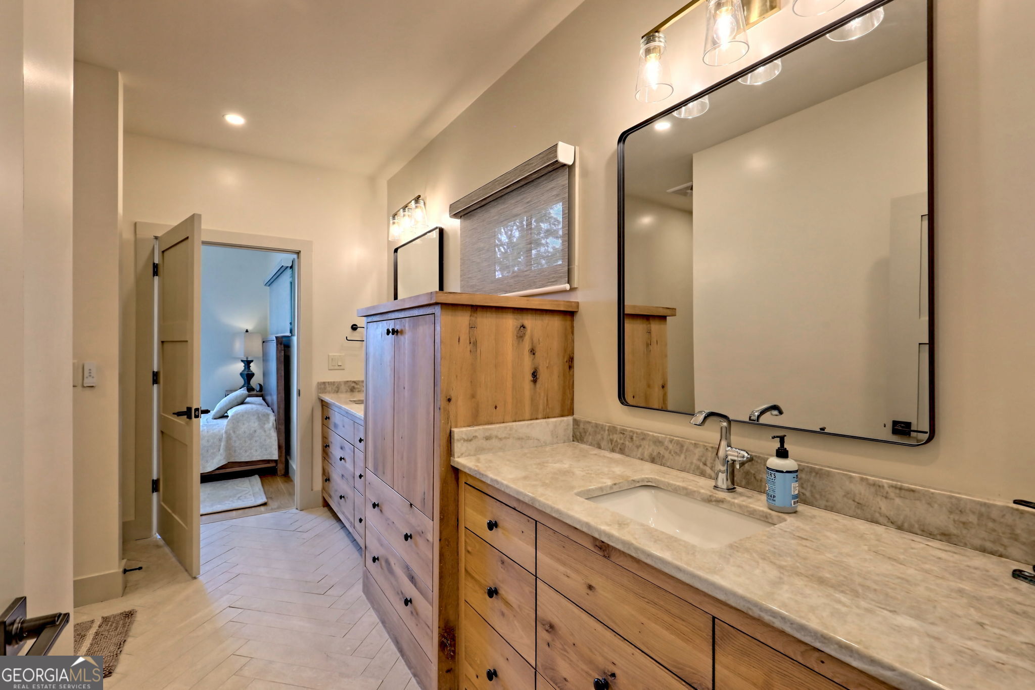 1095 Rabun Bluffs Drive Lakemont, GA 30552 - Photo 35 of 57 a spacious bathroom with a granite countertop sink mirror and shower