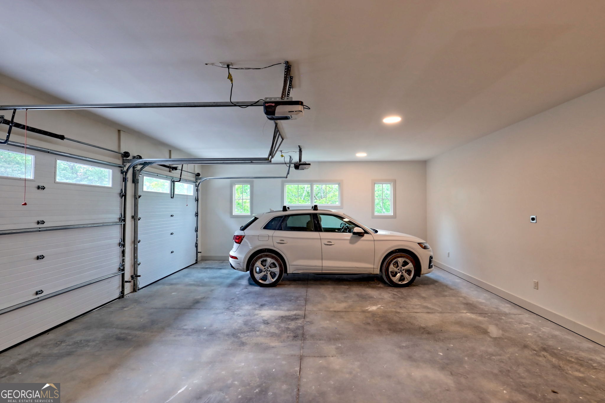 1095 Rabun Bluffs Drive Lakemont, GA 30552 - Photo 44 of 57 a car parked in a garage