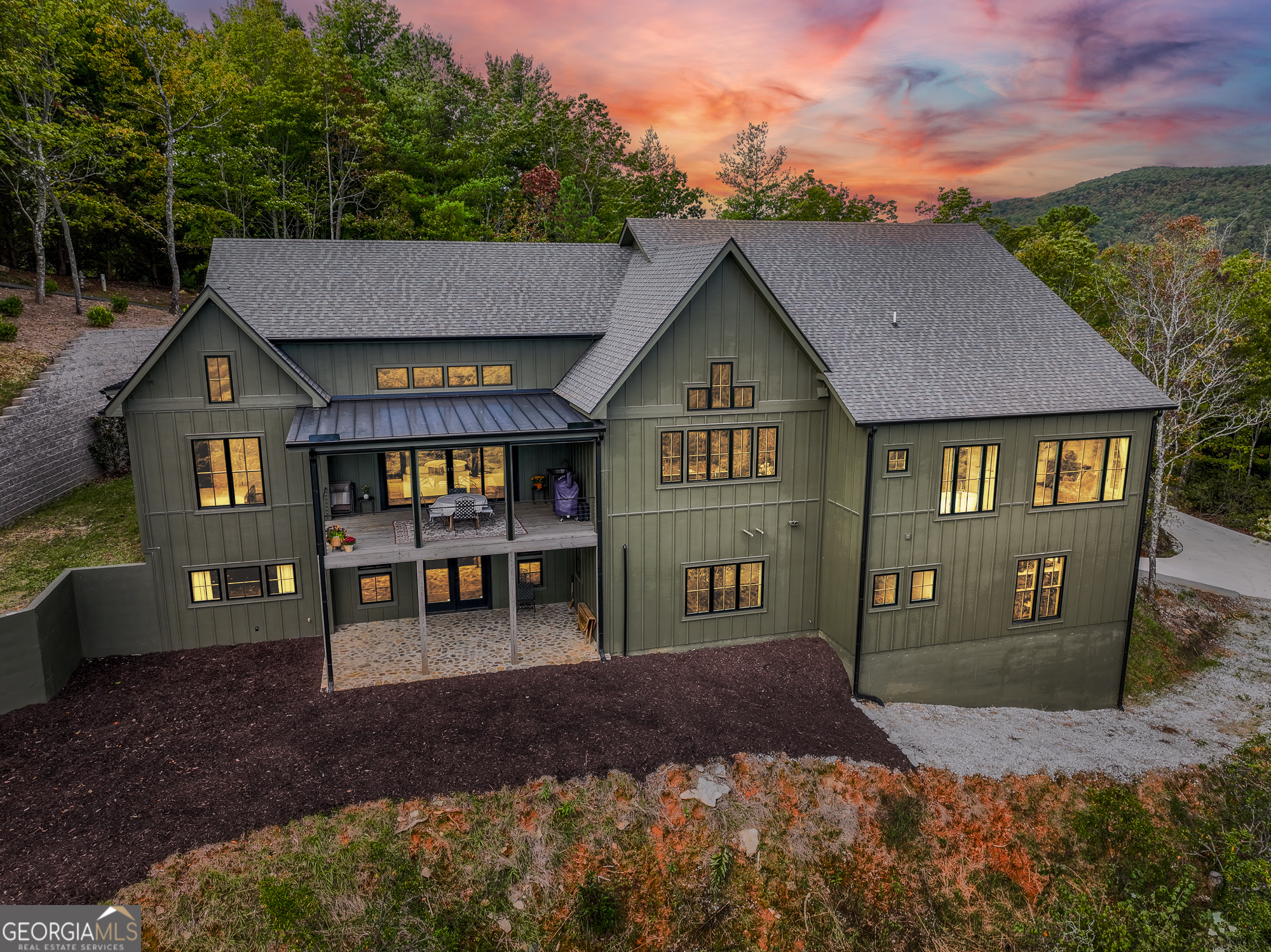 1095 Rabun Bluffs Drive Lakemont, GA 30552 - Photo 56 of 57 a front view of a house with garden