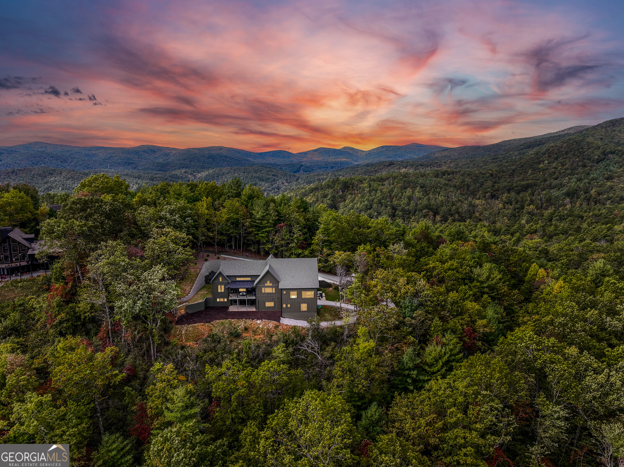 1095 Rabun Bluffs Drive Lakemont, GA 30552 - Photo 57 of 57 a view of a city with lush green forest
