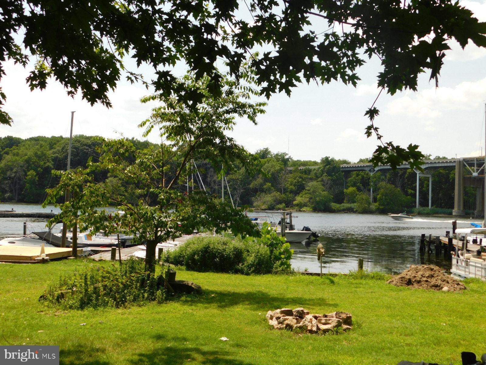 41 River Road Perryville, MD 21903 - Photo 22 of 26 a view of a swimming pool with a garden