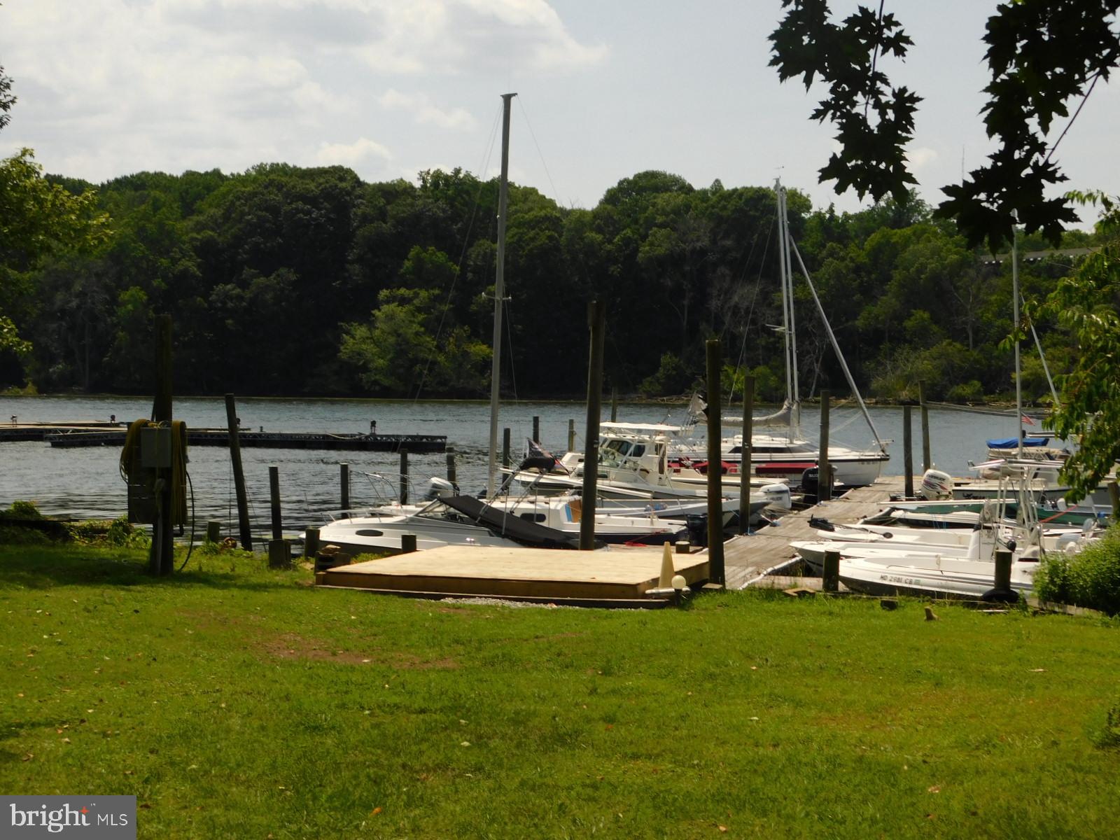 41 River Road Perryville, MD 21903 - Photo 3 of 26 a view of a house with pool and chairs