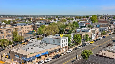 a view of a city with tall buildings