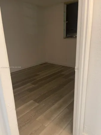 a view of a backyard with plants