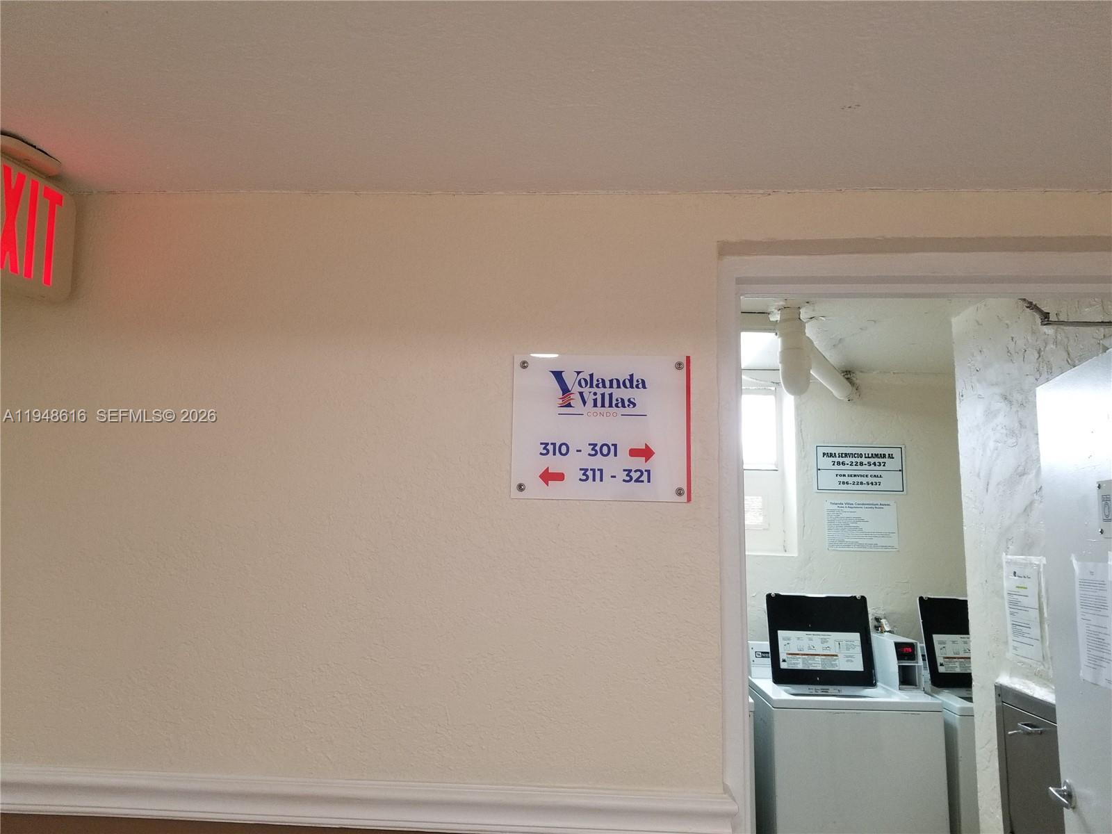 4550 Northwest 9th Street, Unit 801E Miami, FL 33126 - Photo 25 of 31 a room with a refrigerator and a window