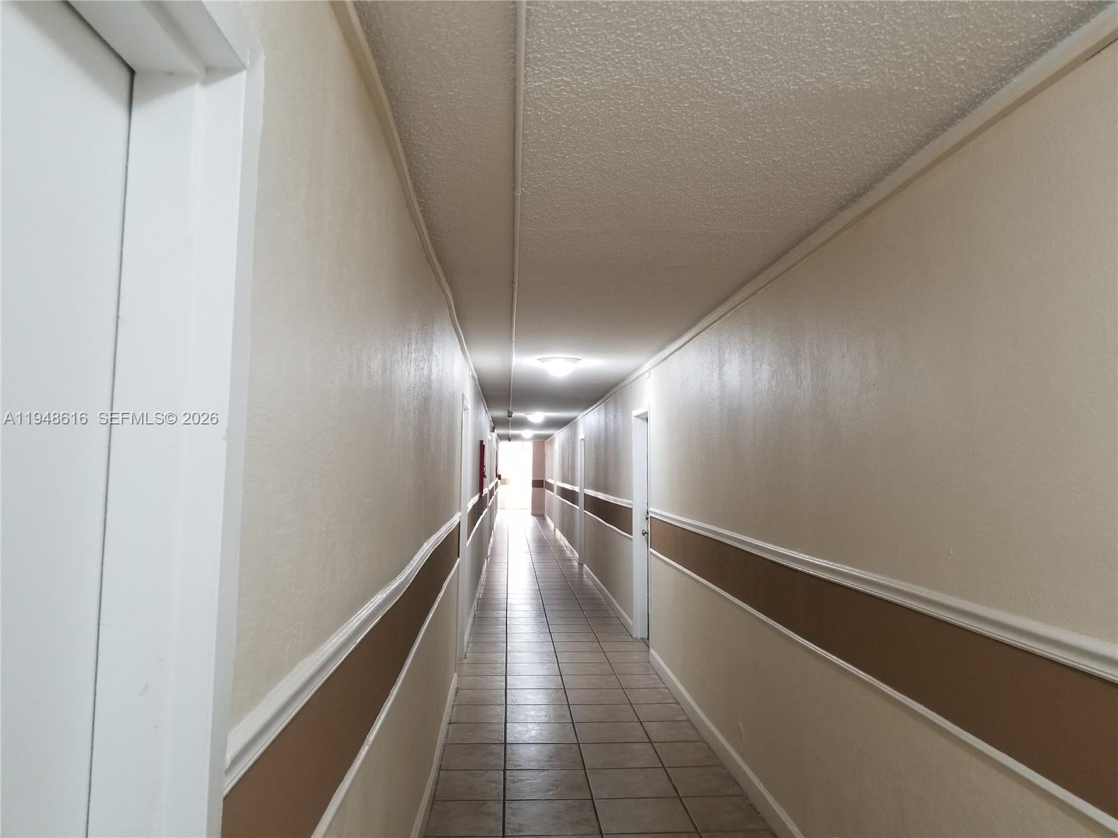4550 Northwest 9th Street, Unit 801E Miami, FL 33126 - Photo 26 of 31 a view of a hallway