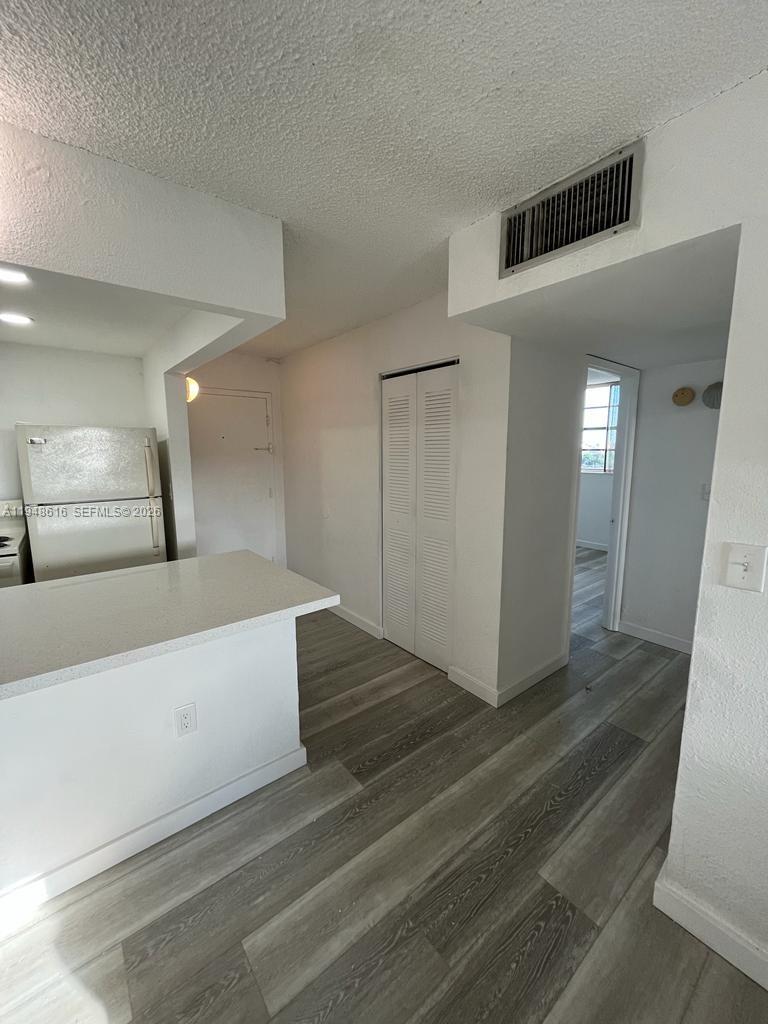 4550 Northwest 9th Street, Unit 801E Miami, FL 33126 - Photo 6 of 31 a view of a hallway view with staircase