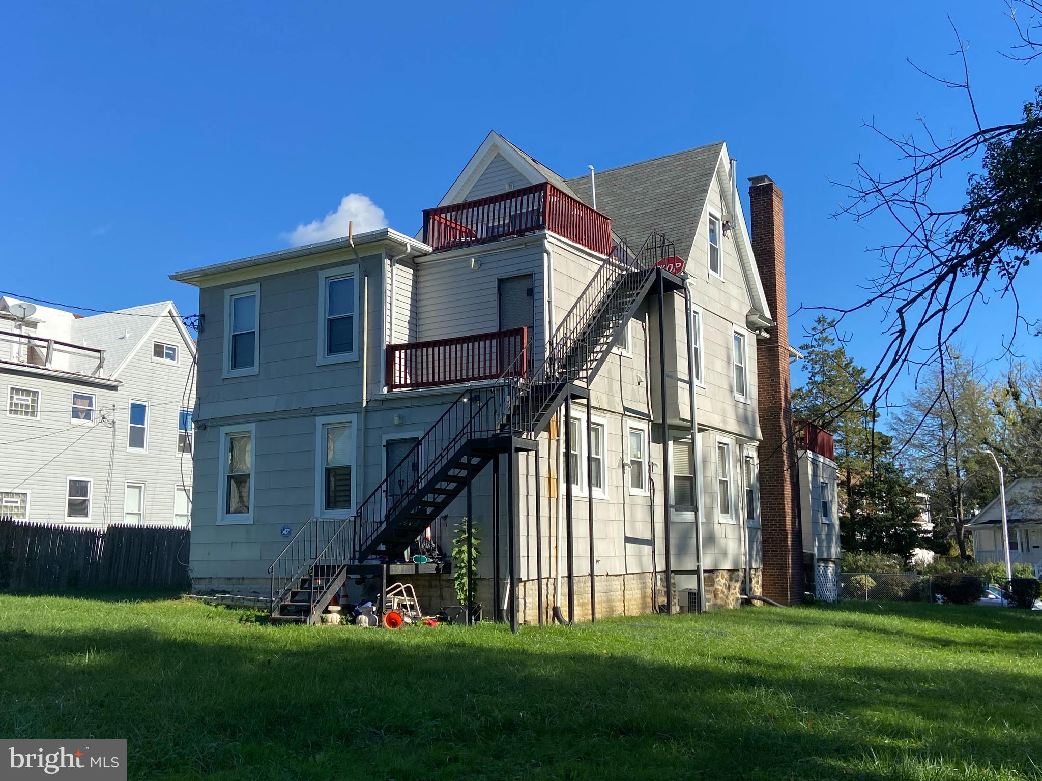 3414 Garrison Boulevard, Unit 3 Baltimore, MD 21215 - Photo 11 of 12 a view of a house with a yard