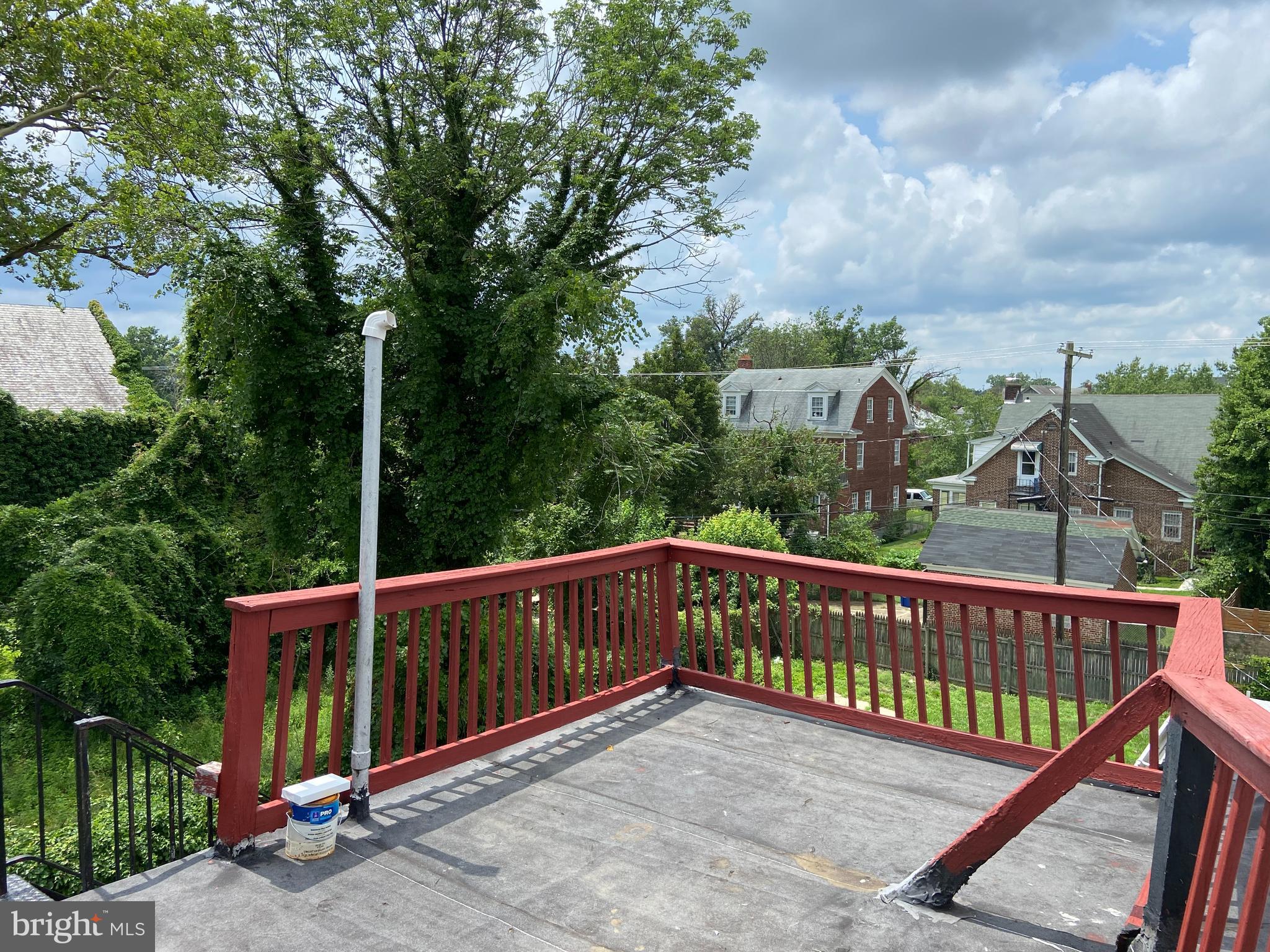 3414 Garrison Boulevard, Unit 3 Baltimore, MD 21215 - Photo 10 of 12 a view of a balcony with yard