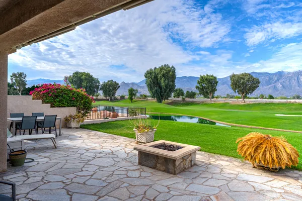 a view of a swimming pool and outdoor space