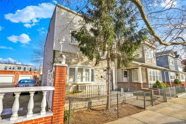 a view of a building with a tree