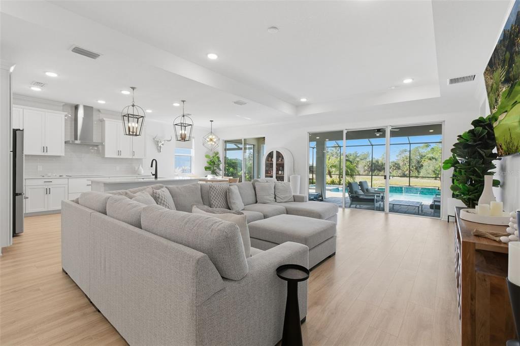 19912 Bridgetown Loop Venice, FL 34293 - Photo 14 of 49 a living room with furniture and a large window