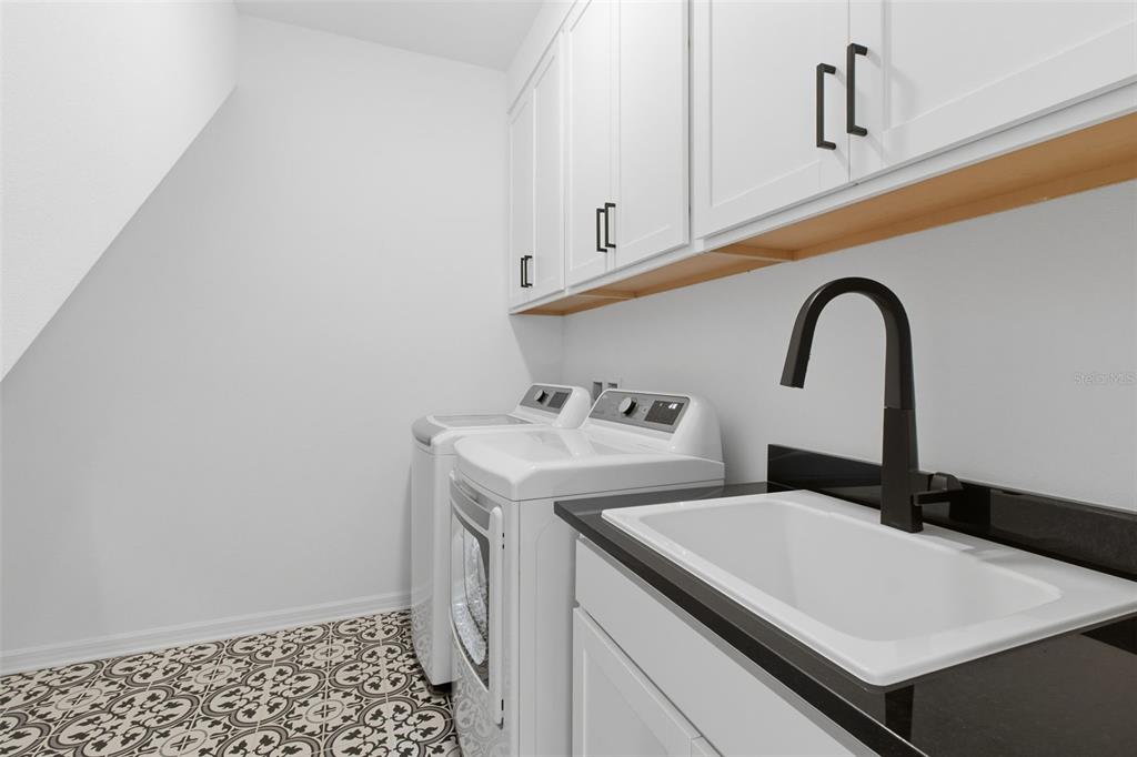 19912 Bridgetown Loop Venice, FL 34293 - Photo 31 of 49 a bathroom with a sink and a toilet