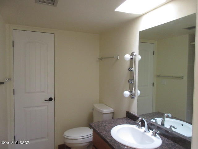 1196 Avenida Leon Rio Rico, AZ 85648 - Photo 20 of 25 a bathroom with a sink a toilet and shower