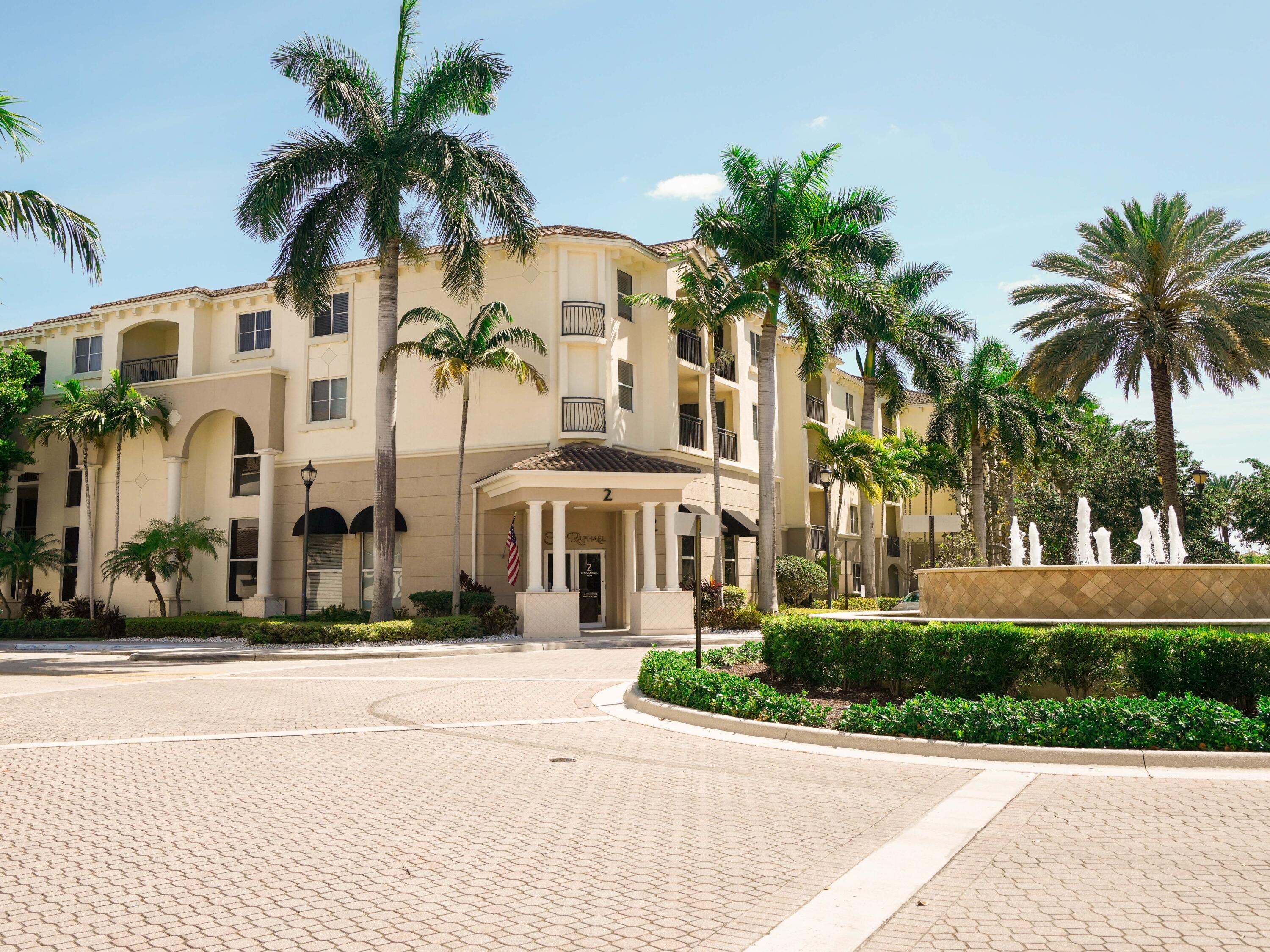 front view of multiple house with palm trees