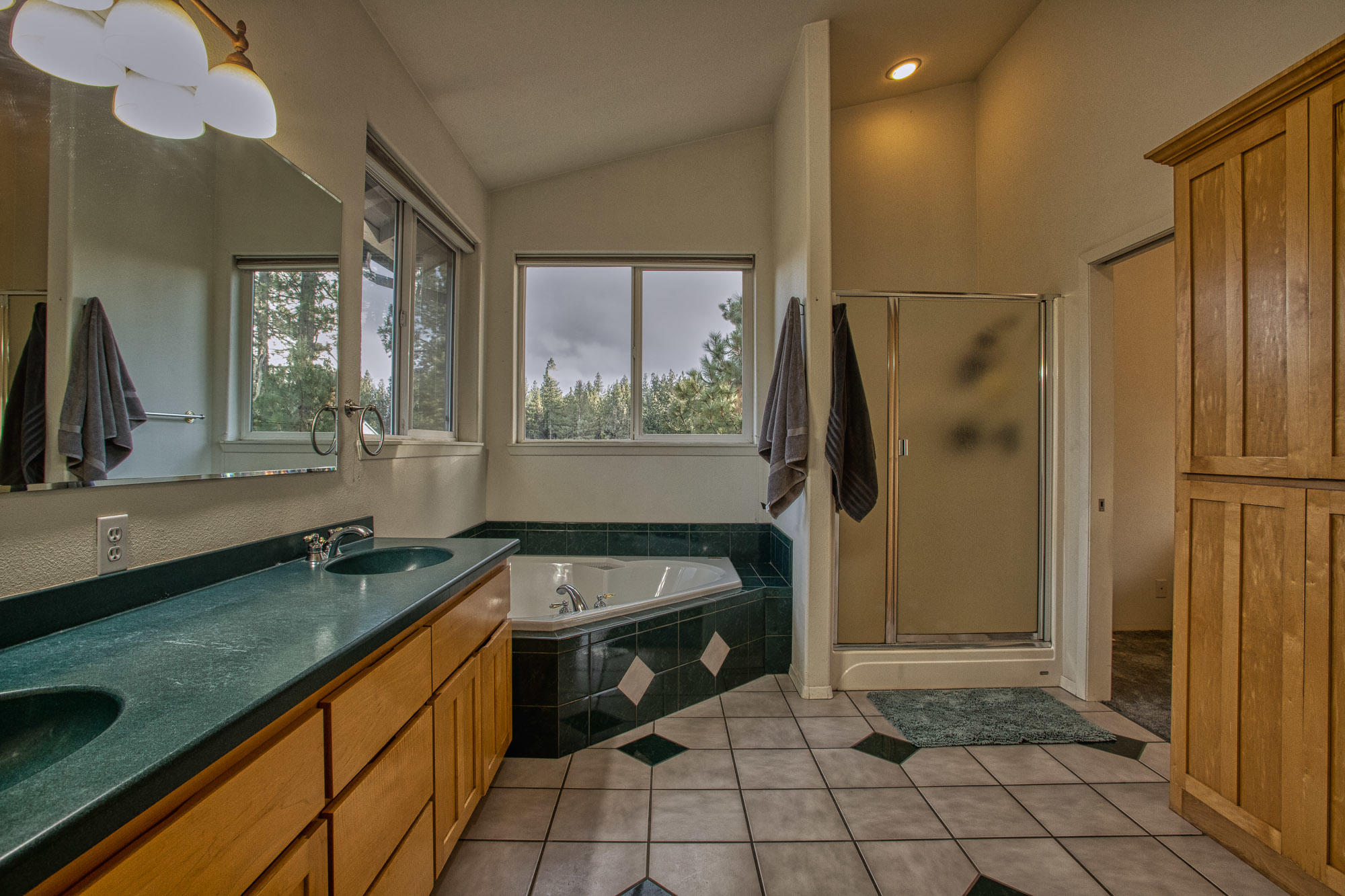 19490 Calico Road Bend, OR 97702 - Photo 24 of 67 a kitchen with a sink stove and refrigerator