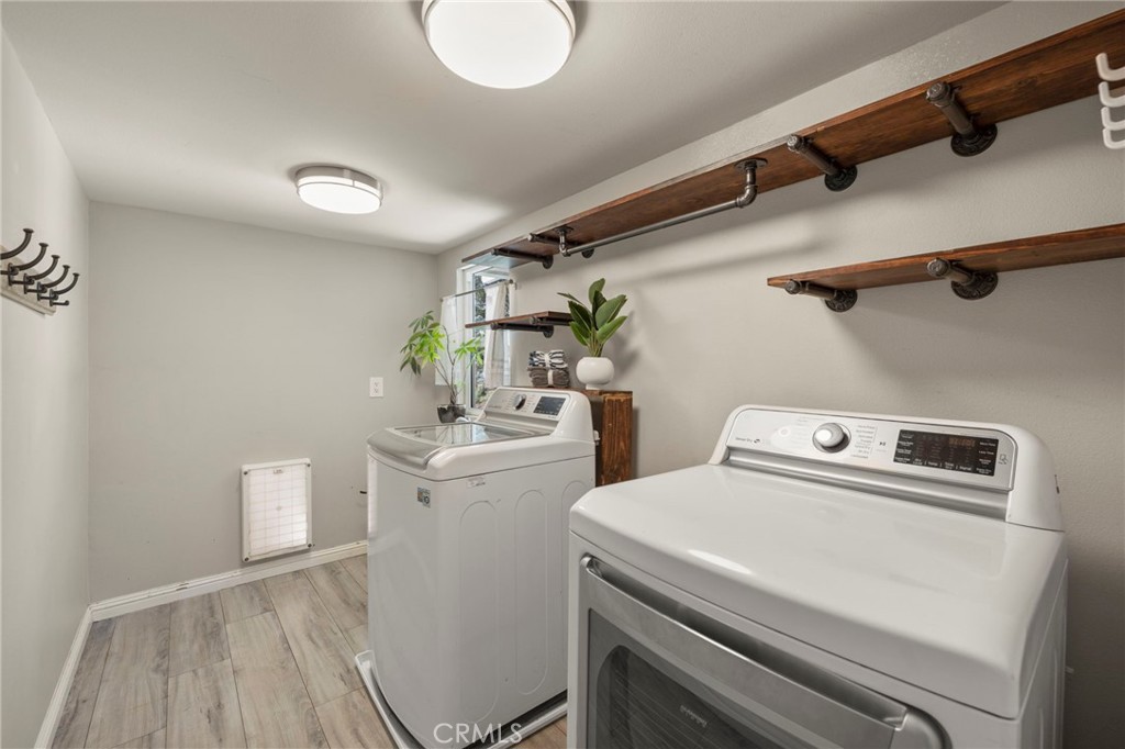 6472 Rainbow Heights Road Rainbow, CA 92028 - Photo 53 of 65 a utility room with dryer and washer