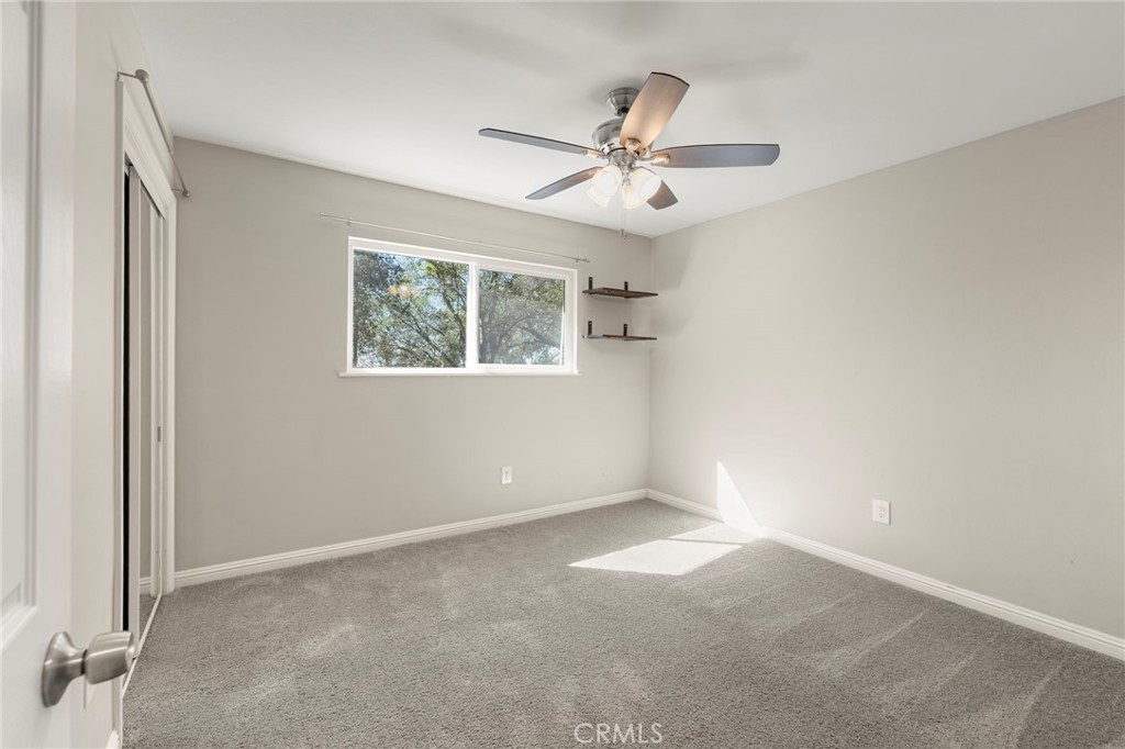 6472 Rainbow Heights Road Rainbow, CA 92028 - Photo 54 of 65 a view of an empty room with a window