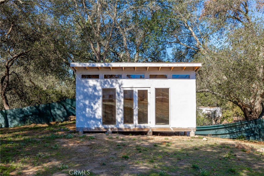 6472 Rainbow Heights Road Rainbow, CA 92028 - Photo 10 of 65 front view of a house with a yard