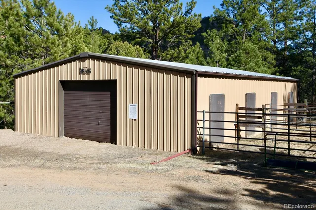 a view of backyard with outdoor seating and green space