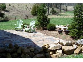 8895 Big Dry Run Road Butler, TN 37640 - Photo 17 of 22 STONED BACK PATIO