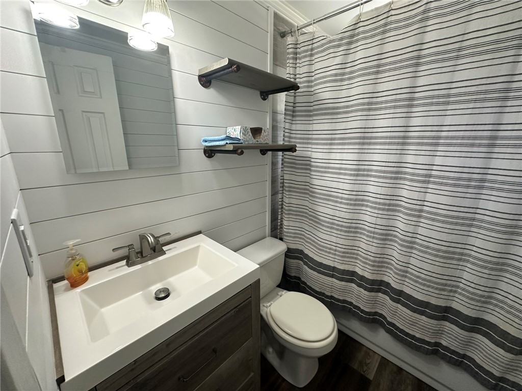 810 South Sandpiper Street Ingleside, TX 78362 - Photo 31 of 40 a bathroom with a sink and toilet