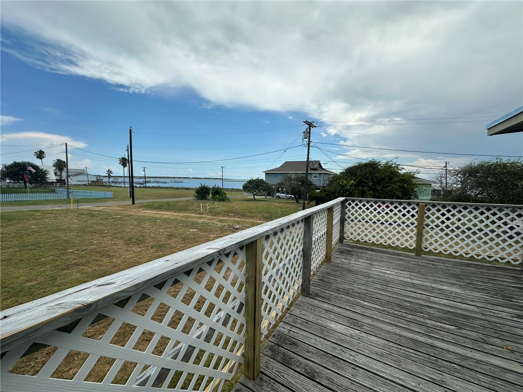 810 South Sandpiper Street Ingleside, TX 78362 - Photo 38 of 40 a view of a balcony with wooden floor